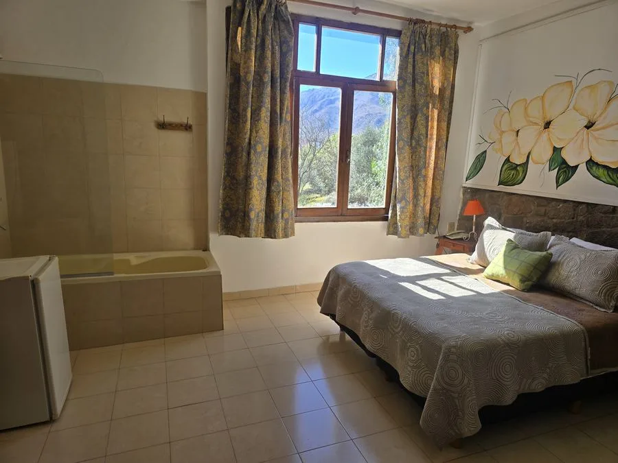 Suite Amanecer con hidromasaje y vista al Cerro Uritorco